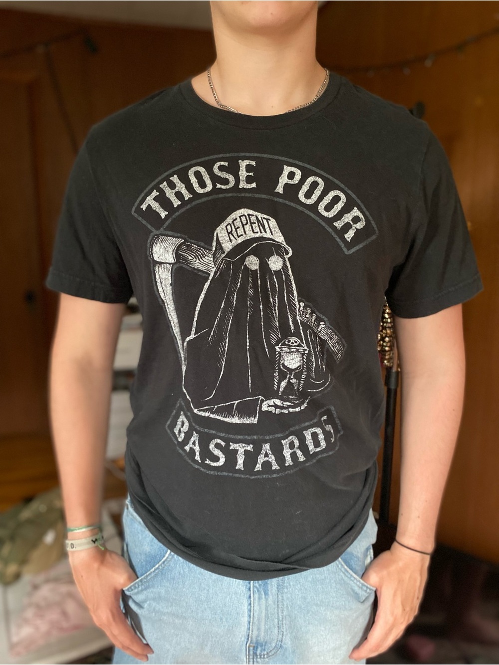 Black Graphic Tee with 'Those Poor Bastards' Design